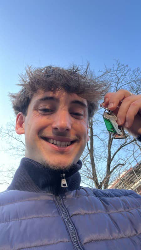 Student holding keys to new student accommodation